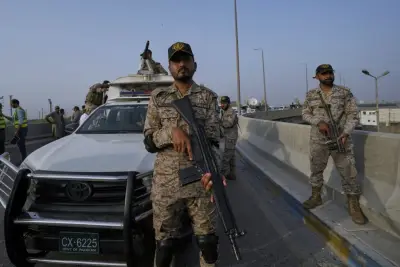 The Latest: Pakistan says India fired missiles at air bases inside the country and Pakistan responds