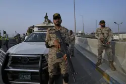 The Latest: Pakistan says India fired missiles at air bases inside the country and Pakistan responds